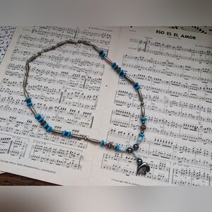 Silver and Blue Beaded Necklace With Polar Bear Charm